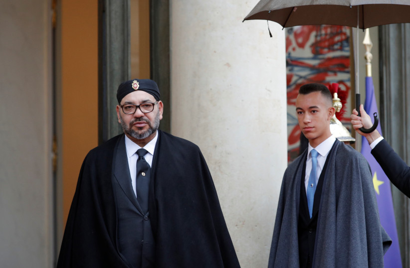  Morocco's King Mohammed VI and his son Crown Prince Moulay Hassan arrive at the Elysee Palace as part of the commemoration ceremony for Armistice Day, 100 years after the end of the First World War, in Paris, France, November 11, 2018. (credit: PHILIPPE WOJAZER/REUTERS)