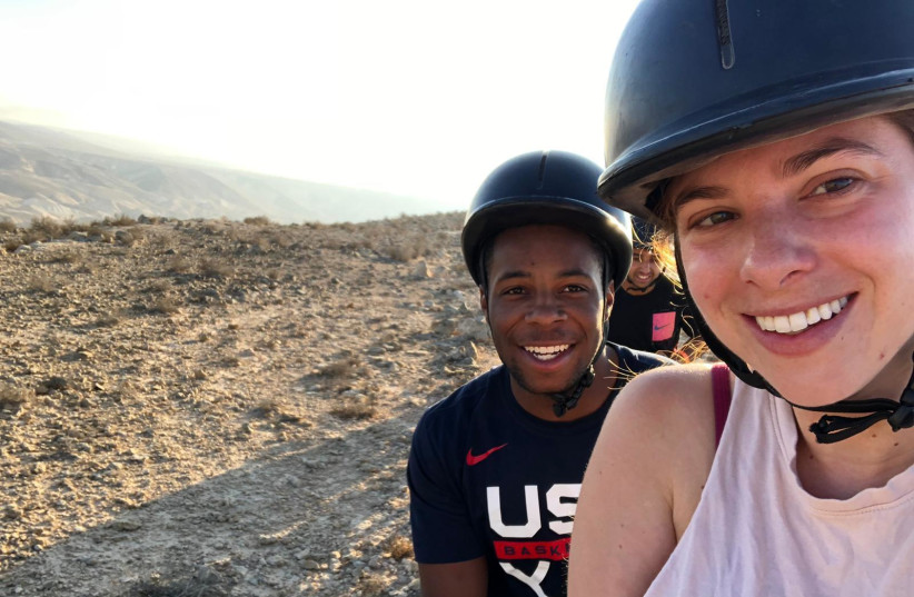  Jared Armstrong, left, on a Birthright Israel trip in 2021. Armstrong, a basketball player who had received an offer to play for an Israeli club team, petitioned the Israeli government for citizenship for months. (credit: Courtesy Jared Armstrong/JTA)