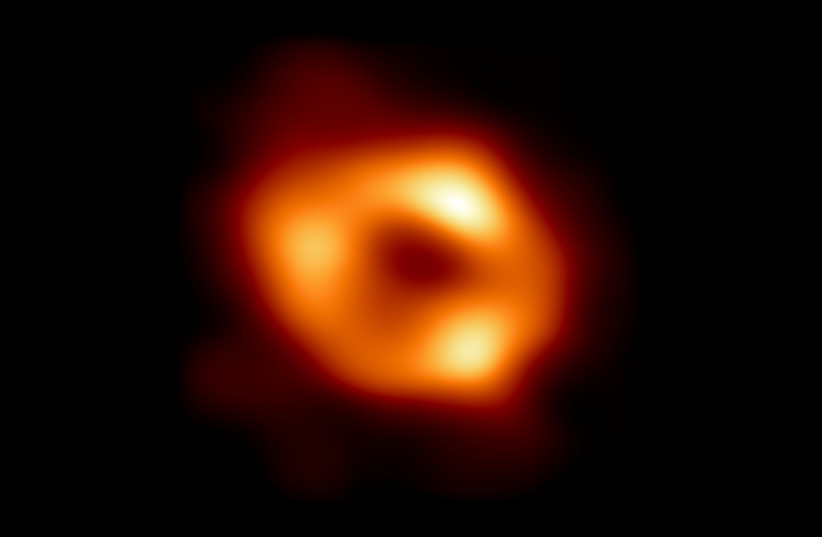  This is the first image of Sagittarius A* (or Sgr A* for short), the supermassive black hole at the center of our galaxy. It was captured by the Event Horizon Telescope (EHT), an array which linked together radio observatories across the planet to form a single ''Earth-sized'' virtual telescope. (credit: EHT Collaboration/National Science Foundation/Handout via REUTERS)