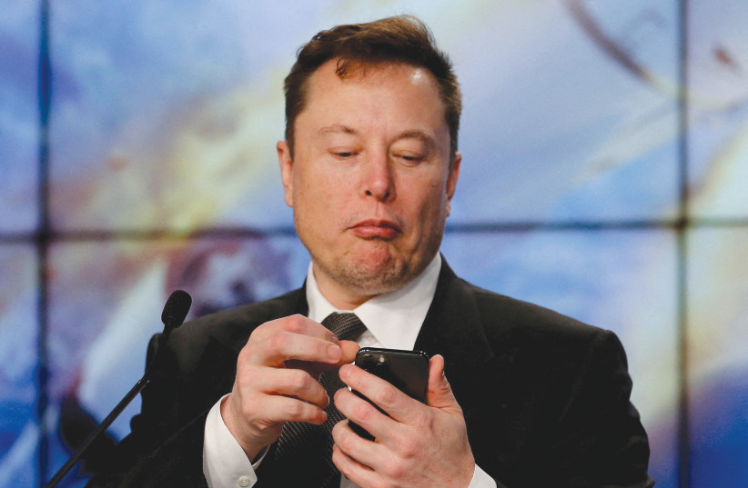 WHICH ELON MUSK was behind the seemingly out-of-the-blue decision to buy Twitter? (credit: JOE SKIPPER/REUTERS)