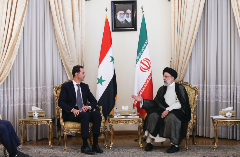  IRAN’S PRESIDENT Ebrahim Raisi meets with Syrian President Bashar Assad in Tehran, earlier this month.  (credit: OFFICIAL PRESIDENTIAL WEBSITE / REUTERS)