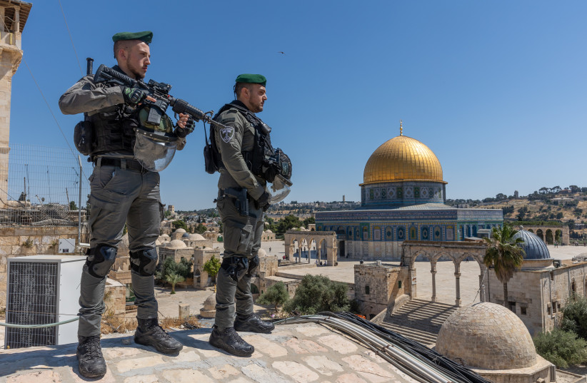Border Police officers stand guard near the Al Aqsa Mosque compound in Jerusalem Old City, on May 25, 2022 (photo credit: YOSSI ALONI/FLASH90)