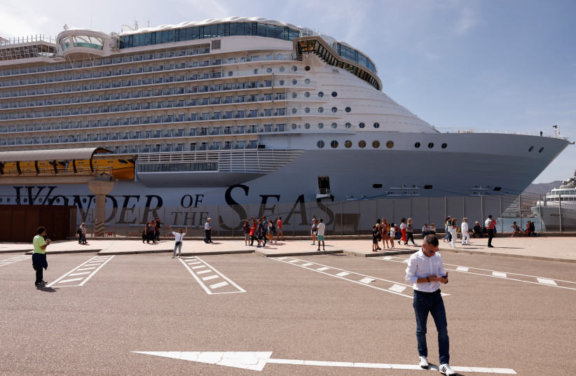  The 'Wonder of the Seas' cruise ship of the company Royal Caribbean, the world’s largest cruise ship, is docked at a port in Malaga, Spain, April 30, 2022.  (credit: REUTERS/JON NAZCA)
