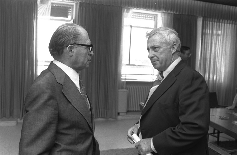  DECEIVED? PRIME minister Menachem Begin with future defense minister Ariel Sharon, 1977. (credit: Ya’akov Sa’ar/GPO)