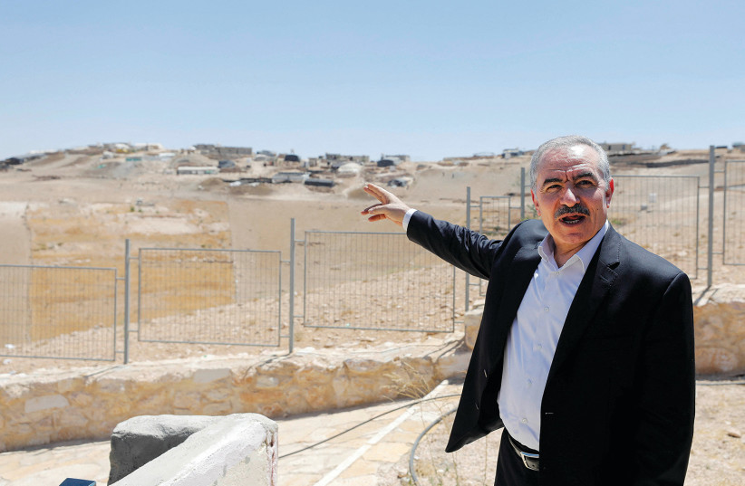  PALESTINIAN AUTHORITY Prime Minister Mohammad Shtayyeh gestures as he visits Masafer Yatta, in the South Hebron Hills, earlier this week. (credit: MUSSA QAWASMA/REUTERS)