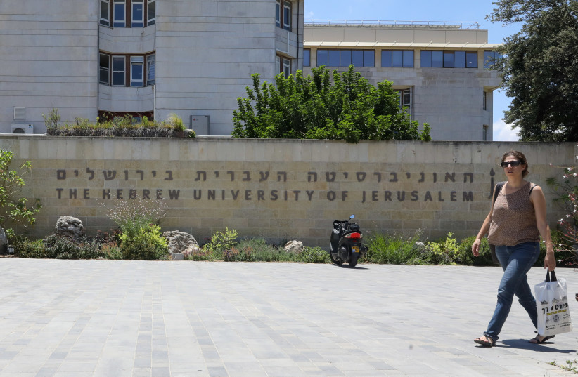  Israelis walking in front of the entrance to the Hebrew University of Jerusalem (credit: MARC ISRAEL SELLEM/THE JERUSALEM POST)