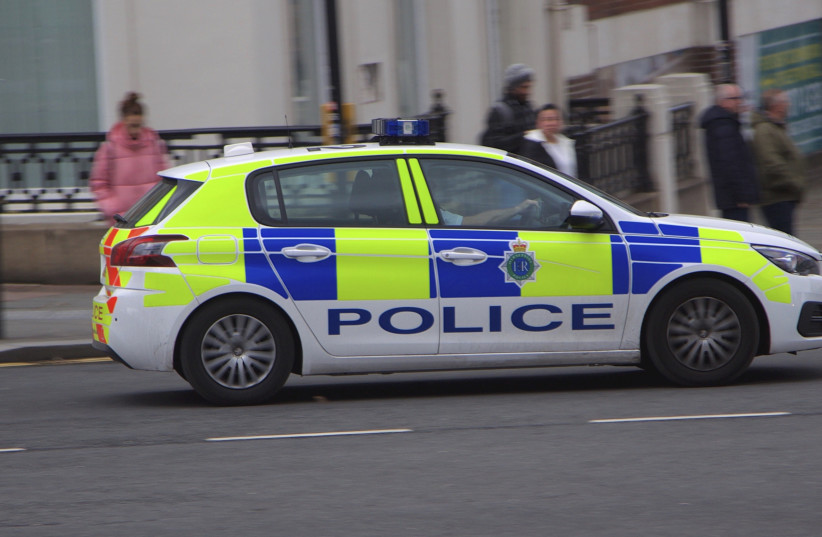  Merseyside Police on their duties through China town district of Liverpool, UK (credit: FLICKR)