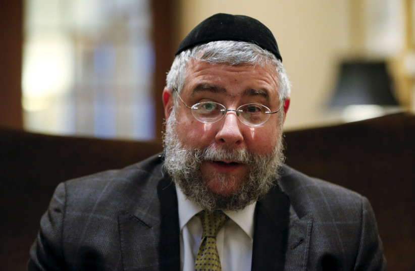 Former chief rabbi of Moscow and President of the Conference of European Rabbis Pinchas Goldschmidt is pictured during an interview with Reuters in a hotel in Berlin, Germany, February 24, 2016 (photo credit: REUTERS/FABRIZIO BENSCH)