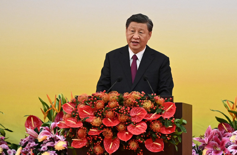  China's President Xi Jinping gives a speech following a swearing-in ceremony to inaugurate the city's new leader and government in Hong Kong, China, July 1, 2022, (credit: REUTERS)