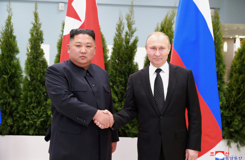 North Korean leader Kim Jong Un shakes hands with Russian President Vladimir Putin in Vladivostok, Russia in this undated photo released on April 25, 2019 by North Korea's Central News Agency (KCNA). (credit: KCNA VIA REUTERS)