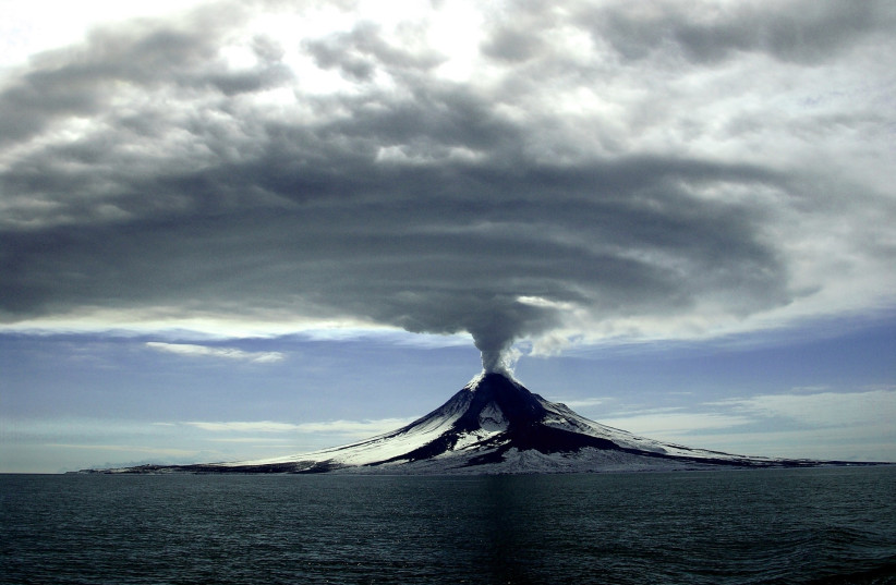 A volcano is seen exploding. The level of devastation it could cause is something the world is not prepared for (Illustrative). (credit: Pixabay/Stockvault)