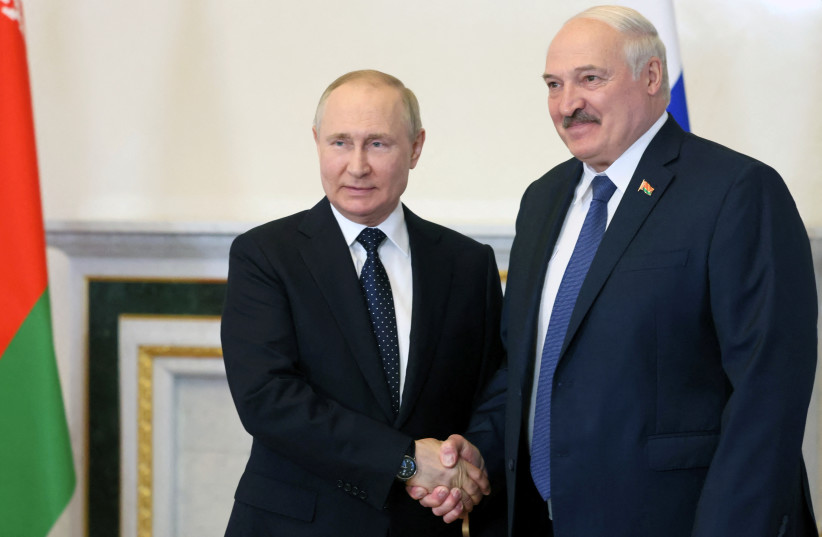  Russian President Vladimir Putin attends a meeting with his Belarusian counterpart Alexander Lukashenko in Saint Petersburg, Russia June 25, 2022 (photo credit: VIA REUTERS)