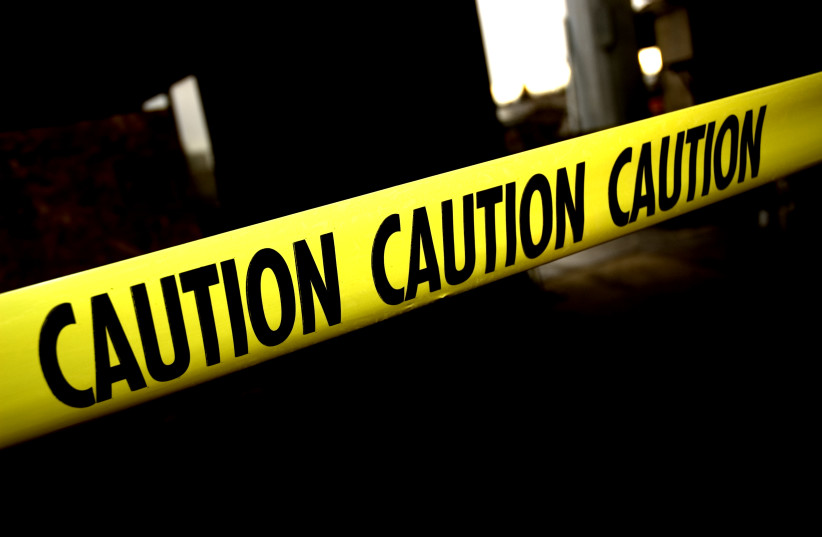 Caution tape (illustrative).