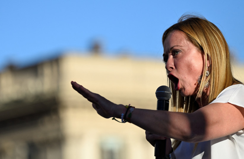  Giorgia Meloni, leader of the far-right Brothers of Italy party, speaks during a rally in Duomo square ahead of the Sept. 25 snap election, in Milan, Italy, September 11, 2022.  (credit: REUTERS/FLAVIO LO SCALZO)