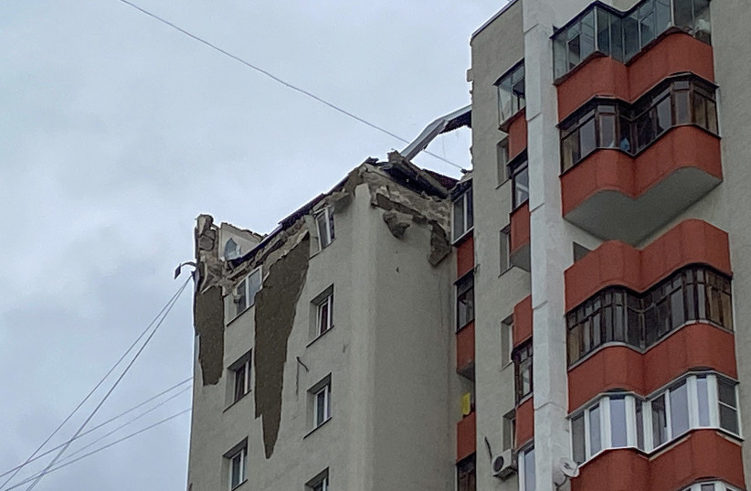  A general view of a multi-story residential building, which was damaged by missiles from an unconfirmed location in Belgorod, Russia October 13, 2022.  (credit: REUTERS/STRINGER)