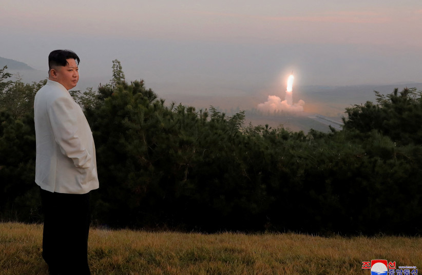 North Korea's leader Kim Jong Un oversees a missile launch at an undisclosed location in North Korea, in this undated photo released on October 10, 2022 by North Korea's Korean Central News Agency (KCNA). (photo credit: KCNA VIA REUTERS/FILE PHOTO)
