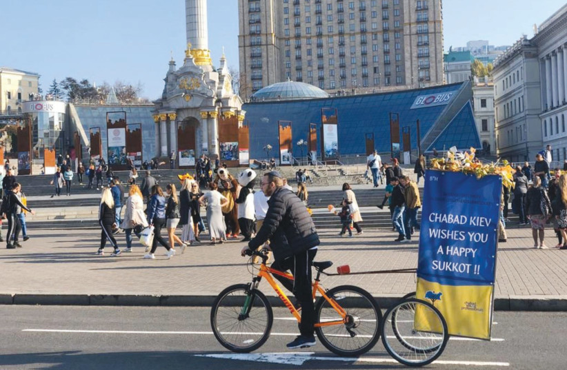  CHABAD EMISSARIES distribute gift packages and sukkot on wheels to the Jews of Ukraine. (credit: Courtesy)
