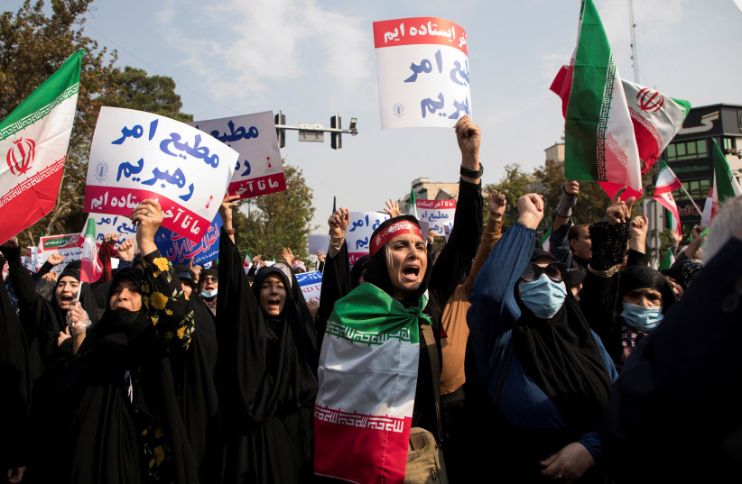  Iranian women chant during a protest condemning the Shiraz attack and unrest in Tehran, Iran October 28, 2022 (photo credit: WEST ASIA NEWS AGENCY/REUTERS)