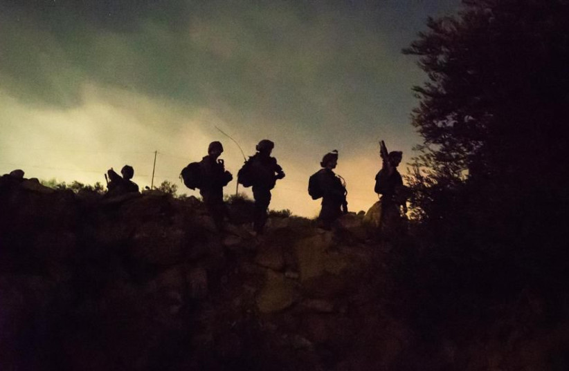 IDF soldiers operate in the West Bank during the ongoing Operation Break the Wave. (credit: IDF SPOKESPERSON'S UNIT)