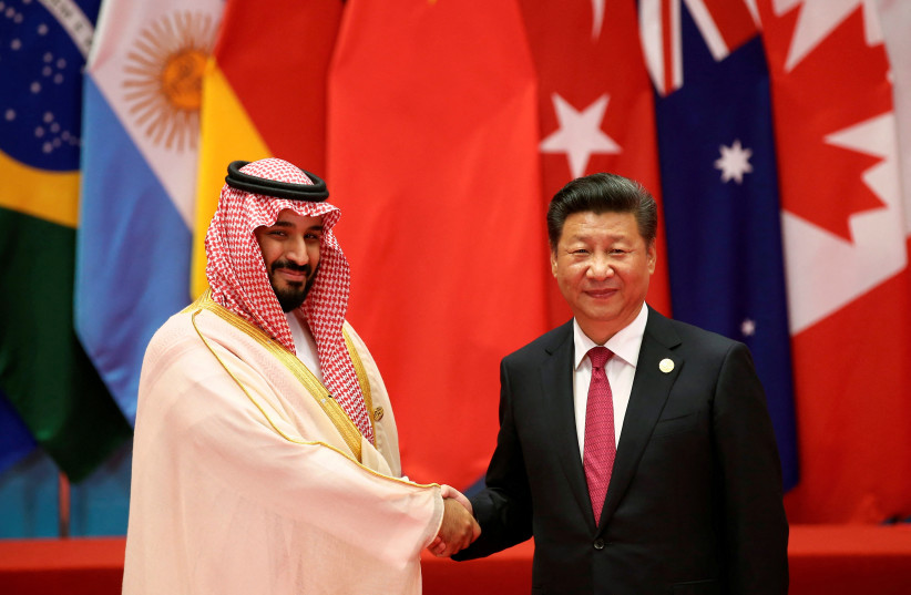  Chinese President Xi Jinping shakes hands with Saudi Arabia's Deputy Crown Prince Mohammed bin Salman during the G20 Summit in Hangzhou, Zhejiang province, China September 4, 2016. (credit: DAMIR SAGOLJ/ REUTERS)