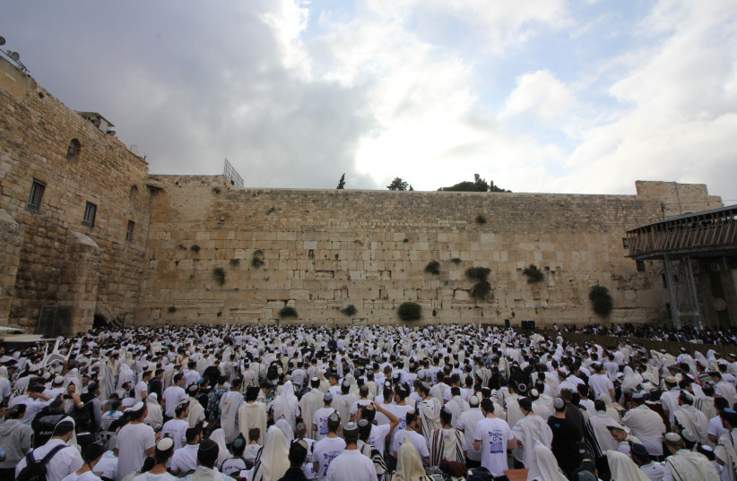 Shacharit prayer at the Western Wall (credit: WESTERN WALL HERITAGE FOUNDATION)