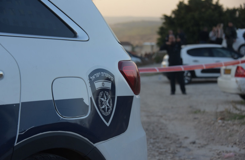 Police operate at against the law scene in Nazareth, December 2022. (photograph credit: AVSHALOM SASSONI/MAARIV)