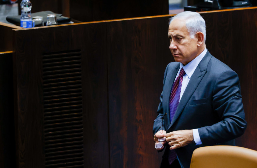  Likud Head MK Benjamin Netanyahu seen during a plenum session at the assembly hall of the Knesset, the Israeli parliament in Jerusalem, on December 19, 2022.  (credit: OLIVIER FITOUSSI/FLASH90)