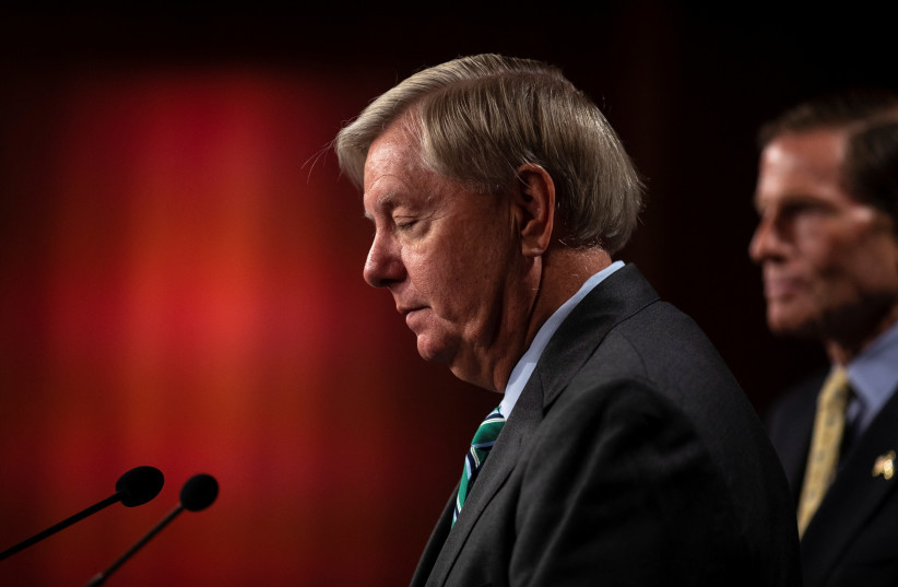  US Senator Lindsey Graham (R-S.C.) looks on during a news conference calling to designate Russia as state sponsor of terrorism, on Capitol Hill, in Washington, US, September 14, 2022.  (photo credit: REUTERS//TOM BRENNER)