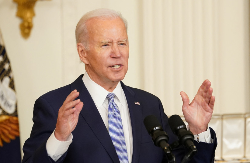 US President Joe Biden delivers remarks during a ceremony marking two years since the January 6, 2021, attack on US Capitol, in the East Room at the White House in Washington, US, January 6, 2023. (credit: REUTERS/KEVIN LAMARQUE)