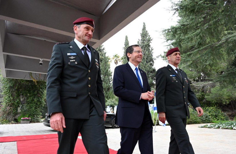  President Isaac Herzog with the new IDF chief of staff Herzi Halevi and his predecessor Aviv Kohavi. (credit: CHAIM TZACH/GPO)