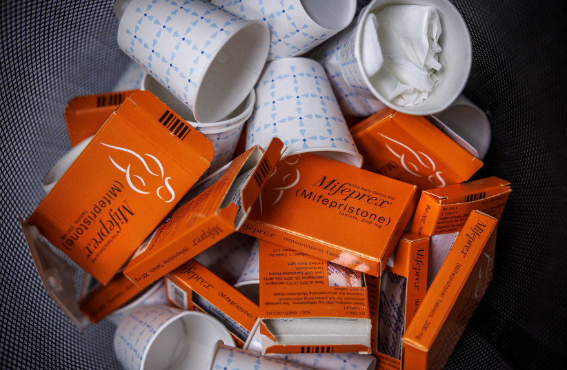  Used boxes of Mifepristone pills, the first drug used in a medical abortion, fill a trash can at Alamo Women's Clinic in New Mexico (photo credit: REUTERS)
