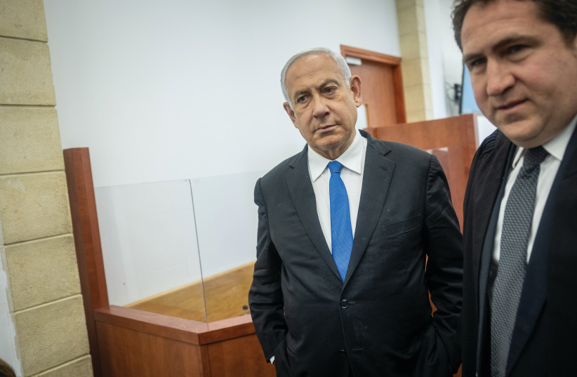  BENJAMIN NETANYAHU arrives at the Jerusalem District Court, last May. Netanyahu is less worried about the rule of law than the court of law where he is on trial on charges of bribery, fraud and breach of trust, says the writer.  (credit: YONATAN SINDEL/FLASH90)