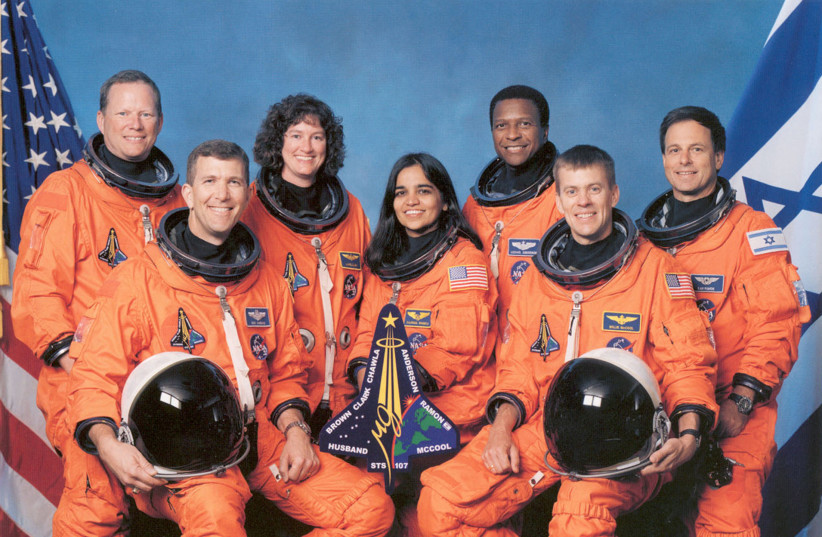 Space Shuttle Columbia mission STS-107 pose at Johnson Space Center in Houston in this January 1,2002 NASA handout photo. Left to right: David Brown, Rick Husband, Laurel Clark, Kalpana Chawla, Michael Anderson, William McCool, Ilan Ramon. (credit: REUTERS)
