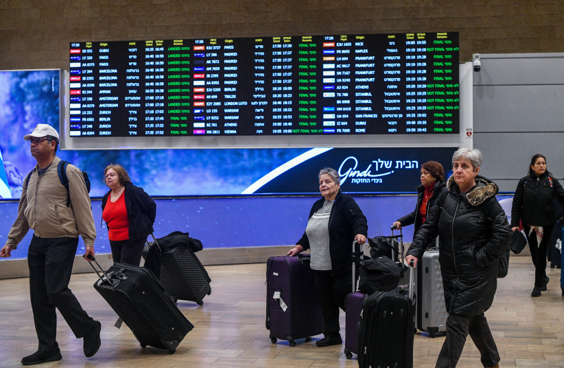  Passengers at the arrival hall in the Ben Gurion International airport near Tel Aviv on February 1, 2023. (credit: ARIE LEIB ABRAMS/FLASH 90)