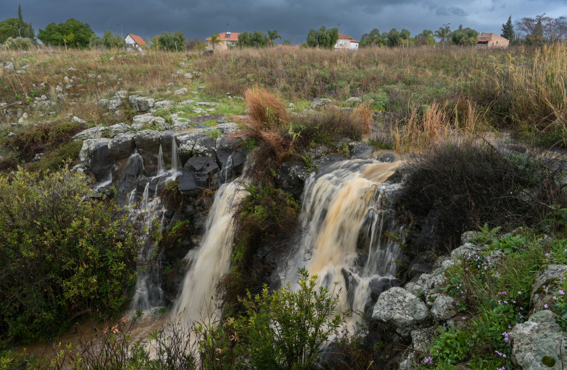  View of the Katzrin stream on a stormy winter day in the northern town of Katzrin, Golan Heights, on February 1, 2023. (photo credit: MICHAEL GILADI/FLASH90)