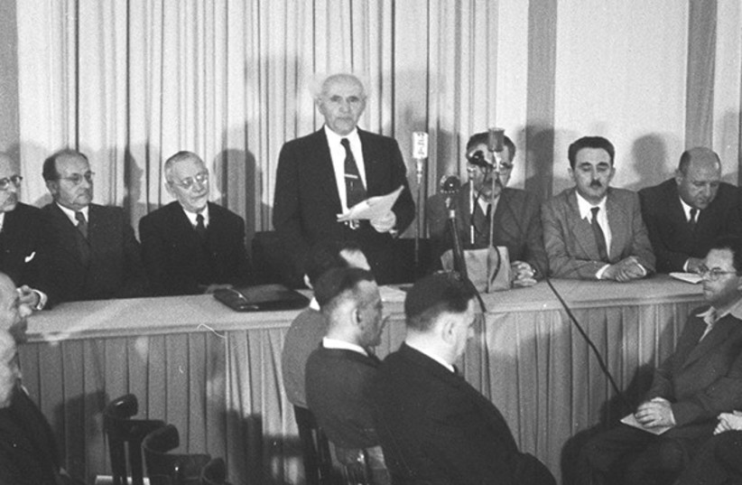  ISRAEL’S FOUNDING fathers declare the establishment of the state with the Declaration of Independence. (credit: KNESSET)