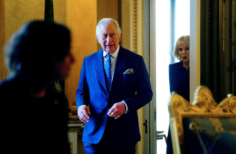  King Charles III and Camilla, the Queen Consort arrive before meeting with genocide survivors at Buckingham Palace, London, to mark Holocaust Memorial Day, in Britain January 27, 2023 (photo credit: VICTORIA JONES/POOL VIA REUTERS)