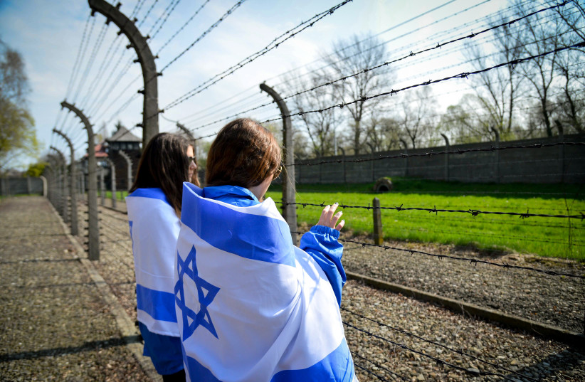  Jewish Youth from all over the world participating in the March of the Living  seen at the Auschwitz-Birkenau camp site in Poland, as Israel marks annual Holocaust Memorial Day, on April 16, 2015. (credit: YOSSI ZELIGER/FLASH90)