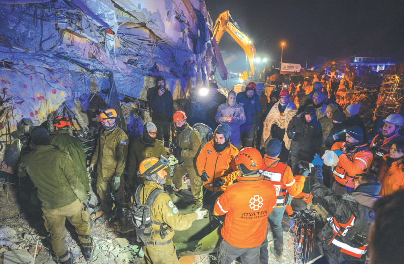  IDF RESCUE workers and members of United Hatzalah work at the site of a collapsed building after the deadly earthquake in Kahramanmaras, Turkey (credit: ERIK MARMOR/FLASH90)