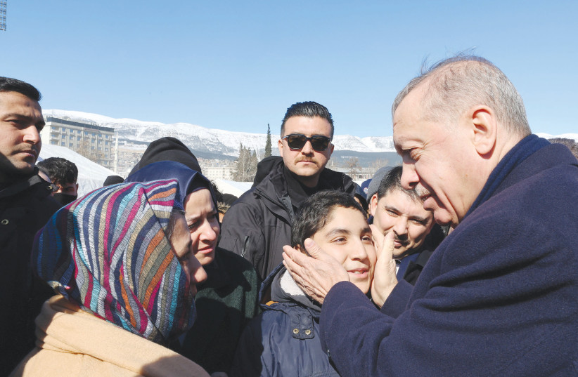  TURKISH PRESIDENT Recep Tayyip Erdogan meets with people in the aftermath of the deadly earthquake in Kahramanmaras Province, last week. (photo credit: PRESIDENTiAL PRESS OFFICE/REUTERS)