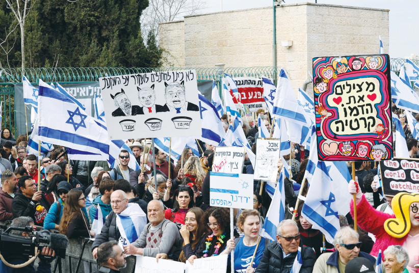  Tens of thousands of protesters participate in a colorful demonstration against the government’s judicial reform outside the Knesset on Monday. (credit: MARC ISRAEL SELLEM/THE JERUSALEM POST)