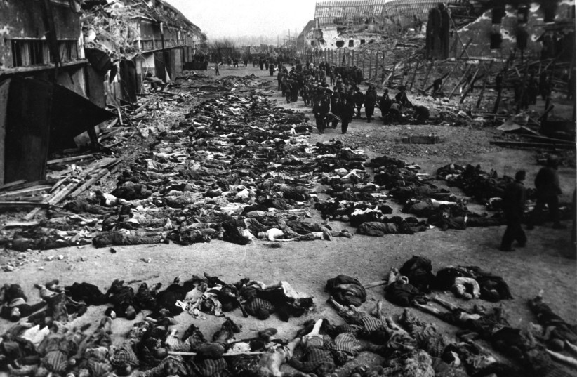  Corpses in the courtyard of Nordhausen concentration camp. (credit: WIKIMEDIA)