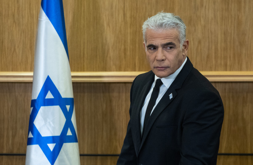  Yesh Atid head MK Yair Lapid speaks during a joint press conference of leaders of the opposition parties, in the Israeli Knesset, in Jerusalem, on February 13, 2023. (photo credit: YONATAN SINDEL/FLASH90)
