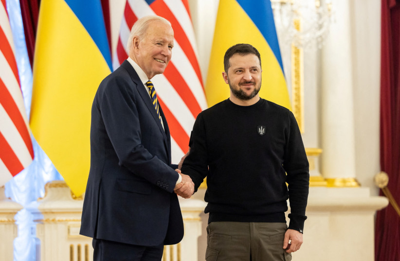 Ukraine's President Volodymyr Zelenskiy and U.S. President Joe Biden shake hands before a meeting (photo credit: REUTERS)