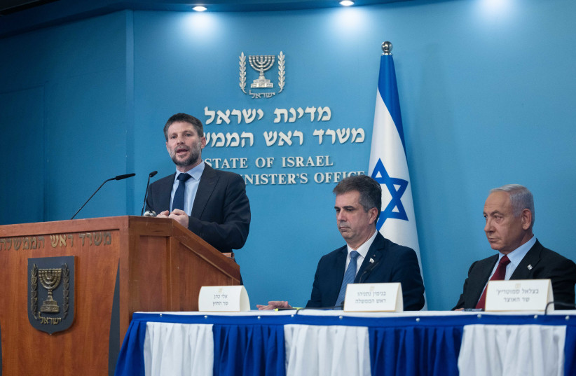  Israeli prime minister Benjamin Netanyahu, Minister of Finance Bezalel Smotrich and Minister of Foreign Affairs Eli Cohen at a press conference, at the Prime Minister's office in Jerusalem, on January 25, 2023.  (credit: YONATAN SINDEL/FLASH90)