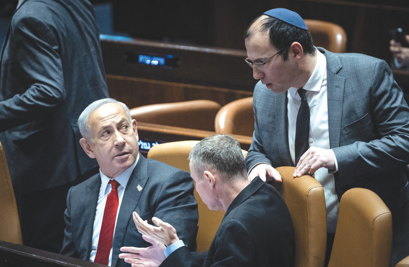  PRIME MINISTER Benjamin Netanyahu looks toward MK Simcha Rothman as they confer with Justice Minister Yariv Levin in the Knesset last week. Levin and Rothman have been emphasizing the larger public welfare, says the writer (photo credit: YONATAN SINDEL/FLASH90)