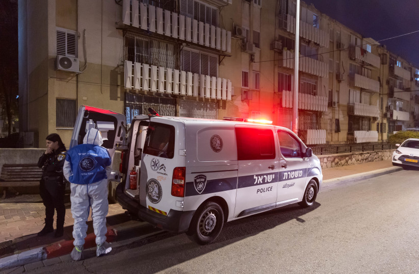  Police at the murder scene where a woman was seriously injured and later died of her injuries in Ashdod, February 21, 2023.  (credit: FLASH90)