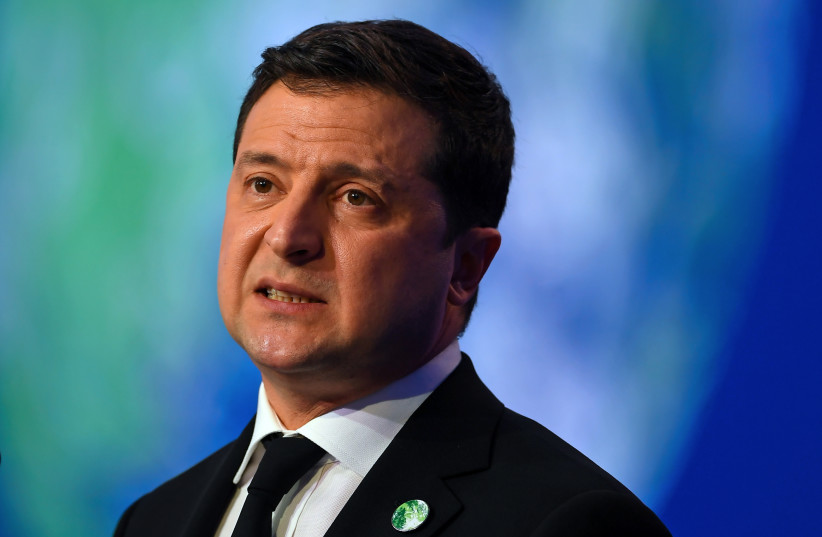 Ukraine's President Volodymyr Zelensky presents his national statement as a part of the World Leaders' Summit at the UN Climate Change Conference (COP26) in Glasgow, Scotland, Britain, November 1, 2021. (credit: ANDY BUCHANAN/POOL VIA REUTERS)