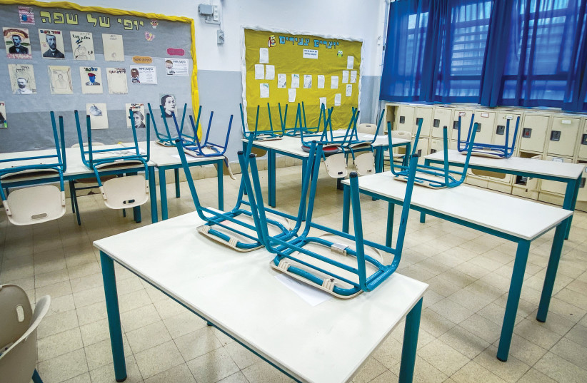  A CLASSROOM at a Tel Aviv school is empty due to a strike called by the Teachers’ Union. (photo credit: AVSHALOM SASSONI/FLASH90)