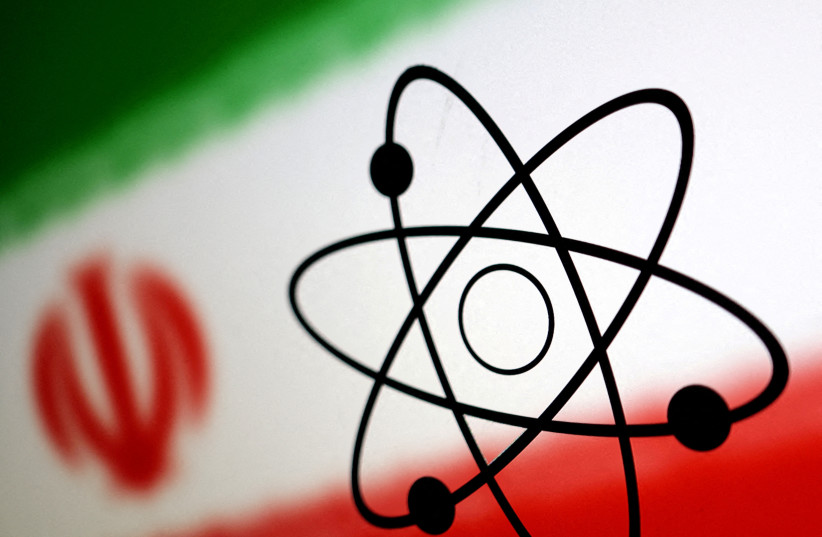 Atom symbol and Iran flag are seen in this illustration, July 21, 2022. (credit: REUTERS/DADO RUVIC/ILLUSTRATION/FILE PHOTO)